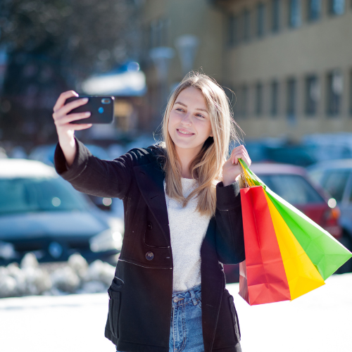 selfie woman with shopping bags - wallet page