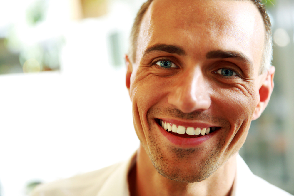 Closeup portrait of a handsome happy man